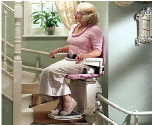 Lady on outdoor stairlift