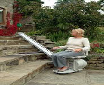 Lady on outdoor stairlift