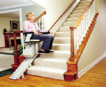 Lady on outdoor stairlift