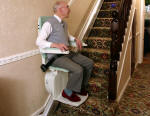 Gent on a fully reconditioned stairlift in London City Centre