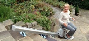 Lady on an outdoor stairlift